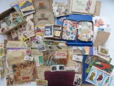 A large collection of cigarette, trade, cards and stamps both loose and in albums