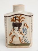 A late 18thC Prattware tea caddy with relief decoration of figures, probably King George III and