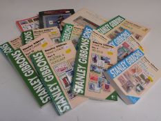 Twelve Stanley Gibbons specialist catalogues including Chinese, France and USA, together with