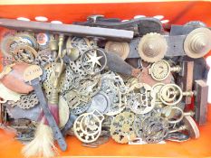 A quantity of Victorian and later horse brasses to include many on pieces of harness including