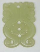 A 19thC Chinese pierced and carved jade panel with scrolling decoration, 6 x 4.4cm