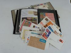GB and foreign first day covers, loose and in two albums, and sundry other sheets and coin/stamp