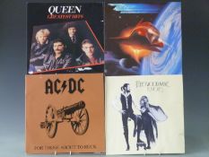 Approximately 200 albums of mixed genres including pop, jazz, rock and classical