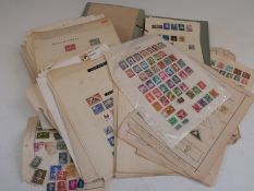 A large quantity of loose album pages, foreign and Commonwealth, all periods