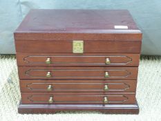 Thomas Pacconi jewellery box with hinged lid and four drawers below, width 40cm