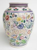 Poole Pottery baluster vase with decoration of persian deer amongst foliage, H33cm