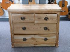 A pine chest of two over two graduated drawers with metal drop handles, W93 x D42 x H75cm