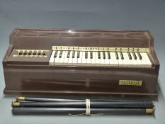Rosedale electric chord organ, 12 bass buttons and three treble octaves