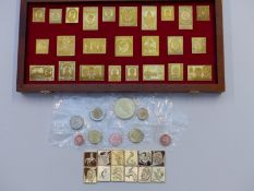 A box of silver ingots in the form of commemorative stamps together with two boxes of 2014