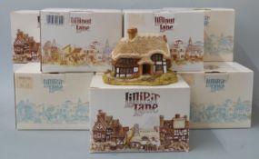 Twelve Lilliput Lane models in boxes