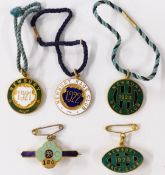 Five Newbury Race Club and other horse racing enamel badges, each with member's number to rear,
