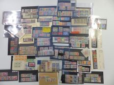 A wide selection of Commonwealth George VI stamps on stockcards. Mainly mint with many complete