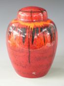 Poole Pottery large covered ginger jar decorated with a red flambé glaze, H32cm