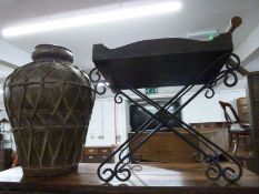 Metal lidded vessel with rafia binding and a butlers tray. H60cm