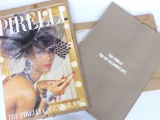 Two Pirelli calendars, one 1973 and the other 1985