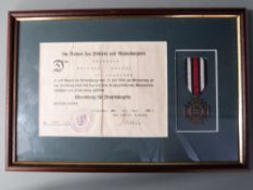 German Army WWI Hindenburg Cross medal with certificate, framed and mounted
