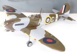 Kit built petrol powered radio controlled model Spitfire aeroplane together with the plans,