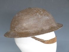 British Army WWII 'Brodie' steel helmet stamped R.O Co Ltd 1939 with liner and chinstrap