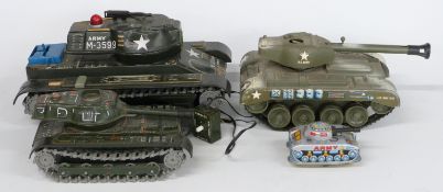 Four Japanese and similar model tanks including one remote control, tinplate, clockwork etc