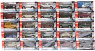 Twenty-five Cararama diecast model vehicles including recovery lorries, Land Rovers etc, all in