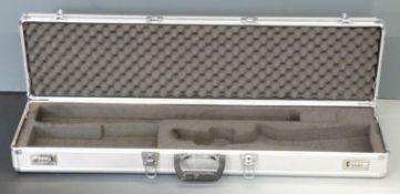 Browning metal fitted wooden shotgun or rifle carry case with fitted interior and coded locks, 97