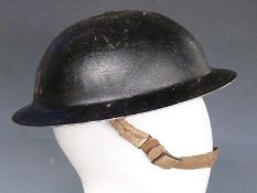British Army WWII 'Brodie' steel helmet stamped JSS 1939 with liner and chinstrap in black