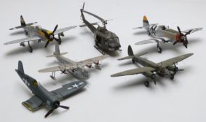Six Corgi and similar diecast model aircraft including UH-1D Huey helicopter, P-47 Thunderbolts,