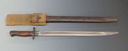British Army bayonet with 43cm fullered blade, in scabbard with canvas frog.