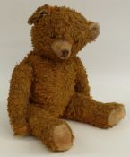 Merrythought cheeky style straw filled Teddy bear with shaved snout, cocked feet and wrists, jointed