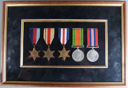 British Army WWII mounted and framed medals comprising 1939/45 Star, Africa Star, France & Germany