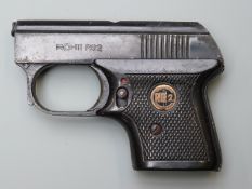 ROHM RG2 .22 starting pistol with monogrammed and chequered grips.