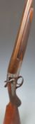 Unnamed 12 bore single barrelled hammer action shotgun with engraved lock, hammer, trigger guard,