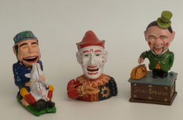 Three novelty cast metal mechanical money boxes comprising stump speaker, man with a pig and a