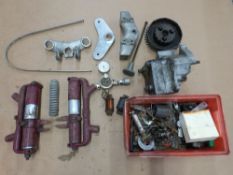 A quantity of motorcycle spares to include Villiers AMC gearbox, BSA plunger units, yokes etc
