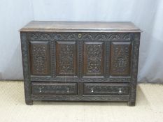 18th century carved oak mule chest with two straight drawers below and candle box within. W129 x