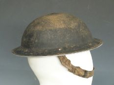 British Army WWII 'Brodie' steel helmet with liner and strap