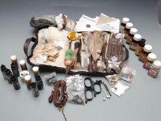 A collection of air rifle and pistol cleaning kit and accessories