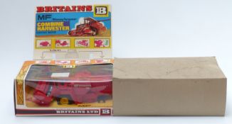 Britains diecast model Massey Ferguson Combine Harvester with red body and reel and yellow hubs