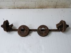 Austin Seven front axle and two further brake drums