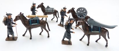Eight CBG Mignot diecast model soldiers and mules.