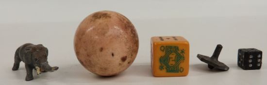 A late 19th/20thC ivory ball, elephant figure dice etc, the ball 32.1mm diameter, weight 33g
