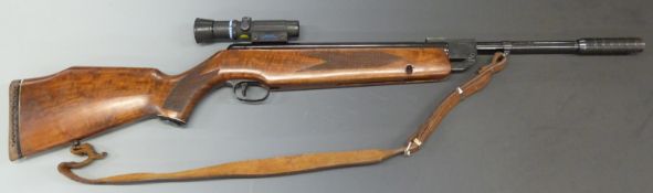 Webley Vulcan .177 air rifle with chequered semi-pistol grip, raised cheek piece to the stock, brown