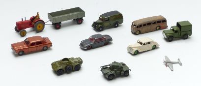 Eleven Dinky Toys diecast model vehicles including military cars, Twin Engined Fighter, Riley