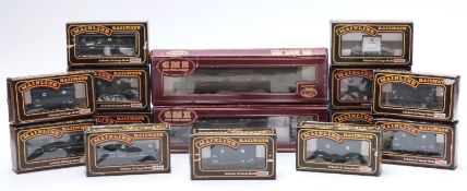 Sixteen 00 gauge model railway wagons comprising thirteen Mainline examples including four Toad