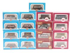 Seventeen 00 gauge model railway goods wagons comprising five Dapol, three GMR and nine Airfix,