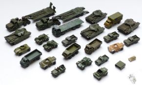 Twenty-three Corgi and Dinky diecast model military vehicles including tanks, Foden lorry etc