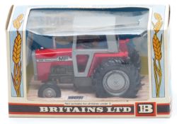Britains diecast model Massey-Ferguson Tractor with red body, silver cab and hubs and driver 9522,