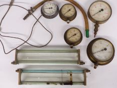 Four pressure gauges, temperature gauge and two steam engine gauge glass protectors
