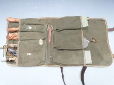 Russian machine gun cleaning kit including bottles, spanners, parts etc in a canvas and leather