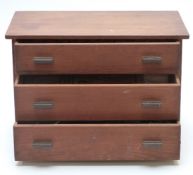 A collection of Meccano parts and Gilbert New Erector construction set items in a pine three